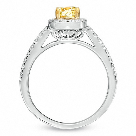 Previously Owned - 1-1/8 CT. T.w. Cushion-Cut Yellow Diamond Frame Bridal Set in 18K White Gold (P/Si2)