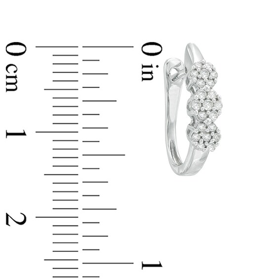 Previously Owned - 1/4 CT. T.w. Diamond Three Flower Hoop Earrings in 10K White Gold