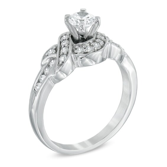 Previously Owned - 1/2 CT. T.w. Diamond Twist Engagement Ring in 10K White Gold