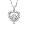 Thumbnail Image 0 of Previously Owned - 1/6 CT. T.W. Diamond Heart Pendant in 10K Two-Tone Gold