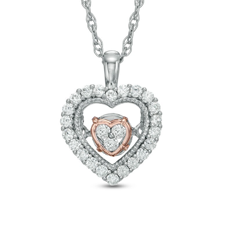 Previously Owned - 1/6 CT. T.W. Diamond Heart Pendant in 10K Two-Tone Gold