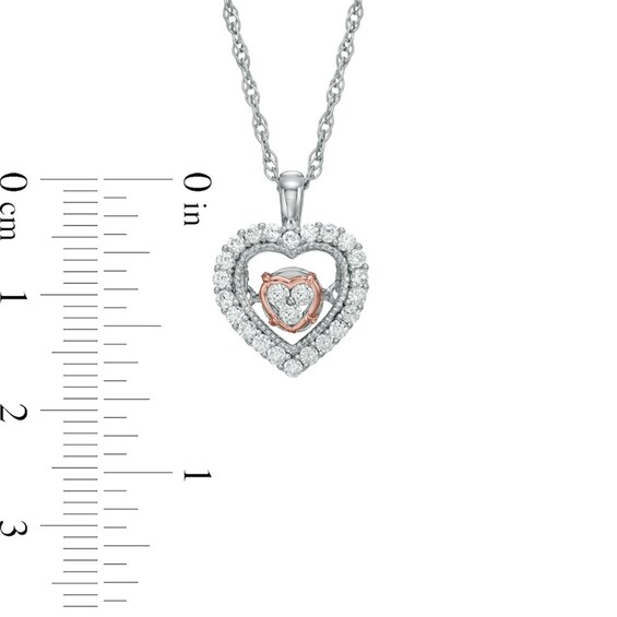 Previously Owned - 1/6 CT. T.w. Diamond Heart Pendant in 10K Two-Tone Gold
