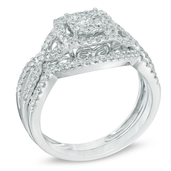 Previously Owned 5/8 CT. T.w. Composite Diamond Frame Twist Shank Soldered Bridal Set in 10K White Gold
