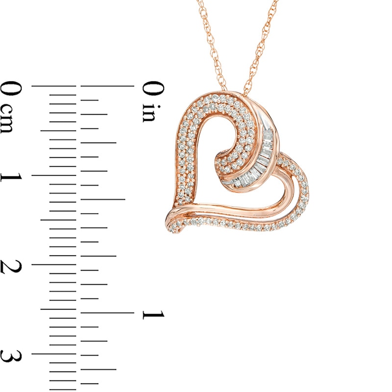 Previously Owned - 1/4 CT. T.W. Baguette and Round Diamond Tilted Heart Pendant in 10K Rose Gold
