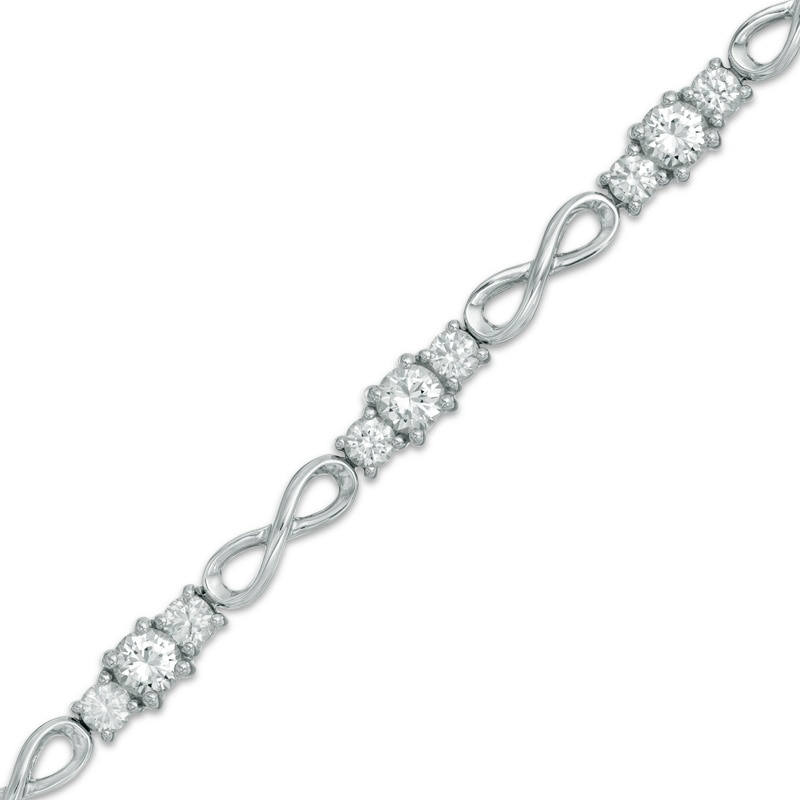 Previously Owned - Lab-Created White Sapphire Infinity Link Three Stone Bracelet in Sterling Silver - 7.25"
