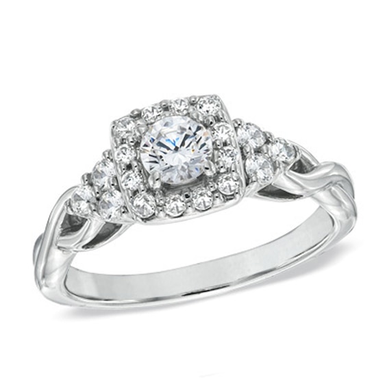 Previously Owned - Celebration Ideal 3/4 CT. T.w. Diamond Tri-Sides Engagement Ring in 14K White Gold (I/I1)