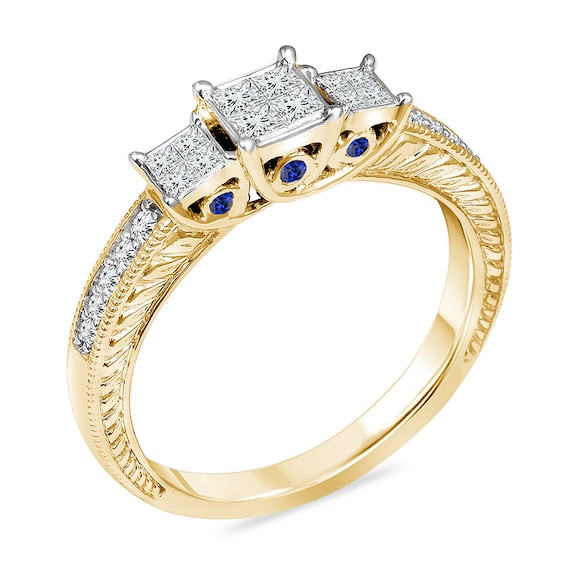 Previously Owned - 1/2 CT. T.w. Enhanced Blue and White Quad Princess-Cut Diamond Three Stone Ring in 10K Gold