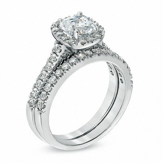 Previously Owned - 1-3/8 CT. T.w. Cushion-Cut Diamond Frame Bridal Set in Platinum (H/Si2)