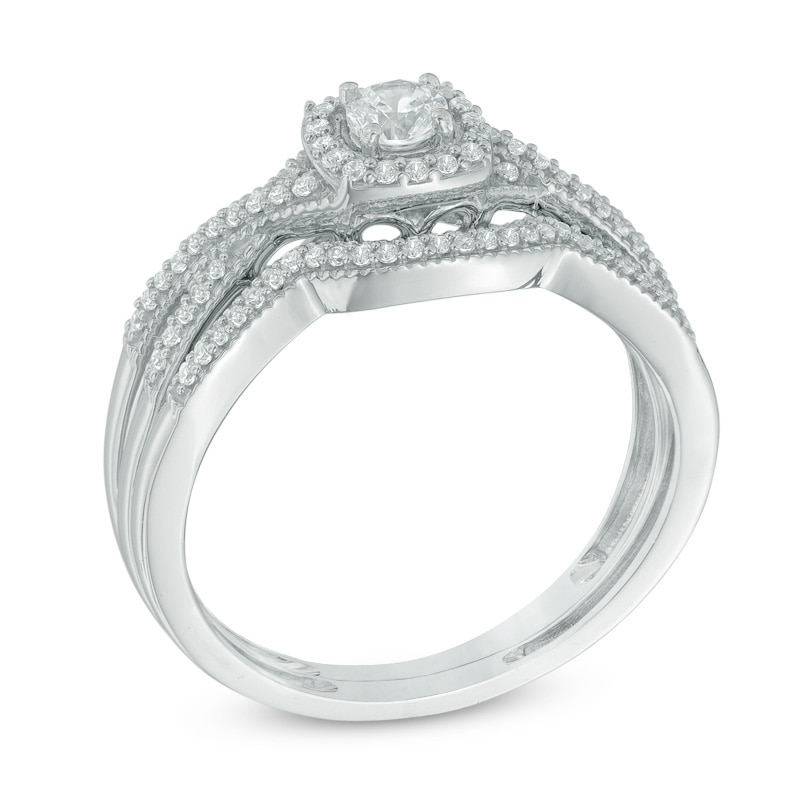 Main Image 2 of Previously Owned - 1/3 CT. T.W. Diamond Cushion Frame Twisted Shank Bridal Set in 10K White Gold