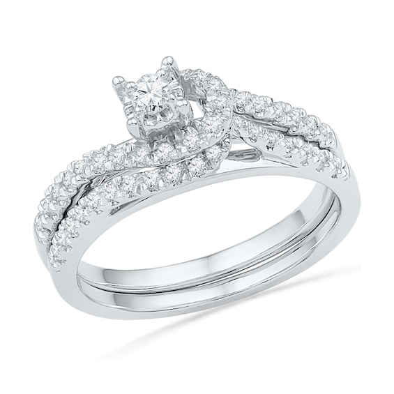Previously Owned - 1/3 CT. T.w. Diamond Knot Bridal Set in 10K White Gold