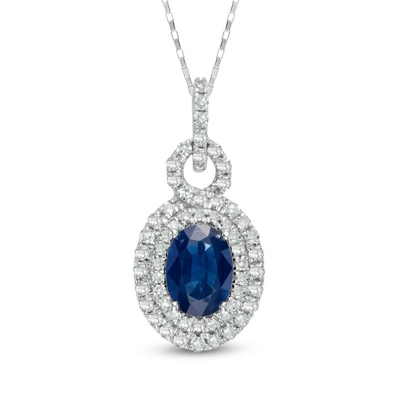 Previously Owned - Oval Blue Sapphire and 1/3 CT. T.W. Diamond Pendant in 10K White Gold