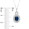 Thumbnail Image 1 of Previously Owned - Oval Blue Sapphire and 1/3 CT. T.W. Diamond Pendant in 10K White Gold