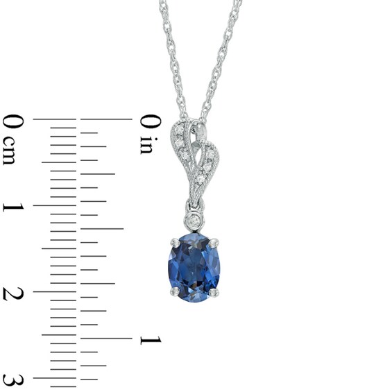 Previously Owned - Oval Lab-Created Blue and White Sapphire Pendant in Sterling Silver