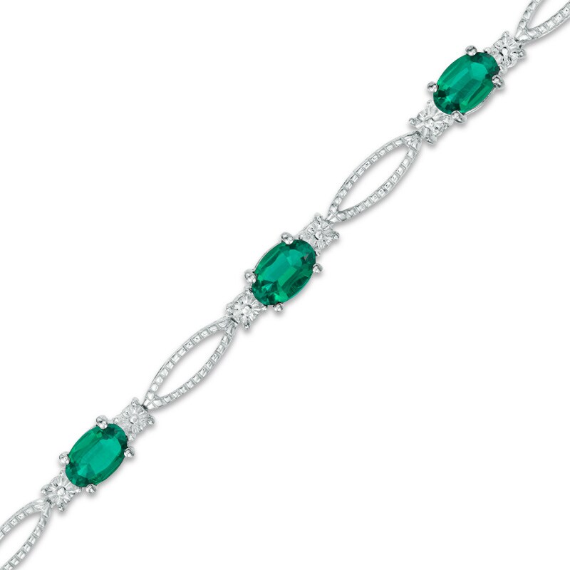 Main Image 1 of Previously Owned - Oval Lab-Created Emerald and Diamond Accent Bracelet in Sterling Silver - 7.25"