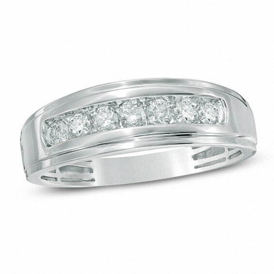 Previously Owned - 1/3 CT. T.w. Diamond Seven Stone Step Edge Anniversary Band in 10K White Gold