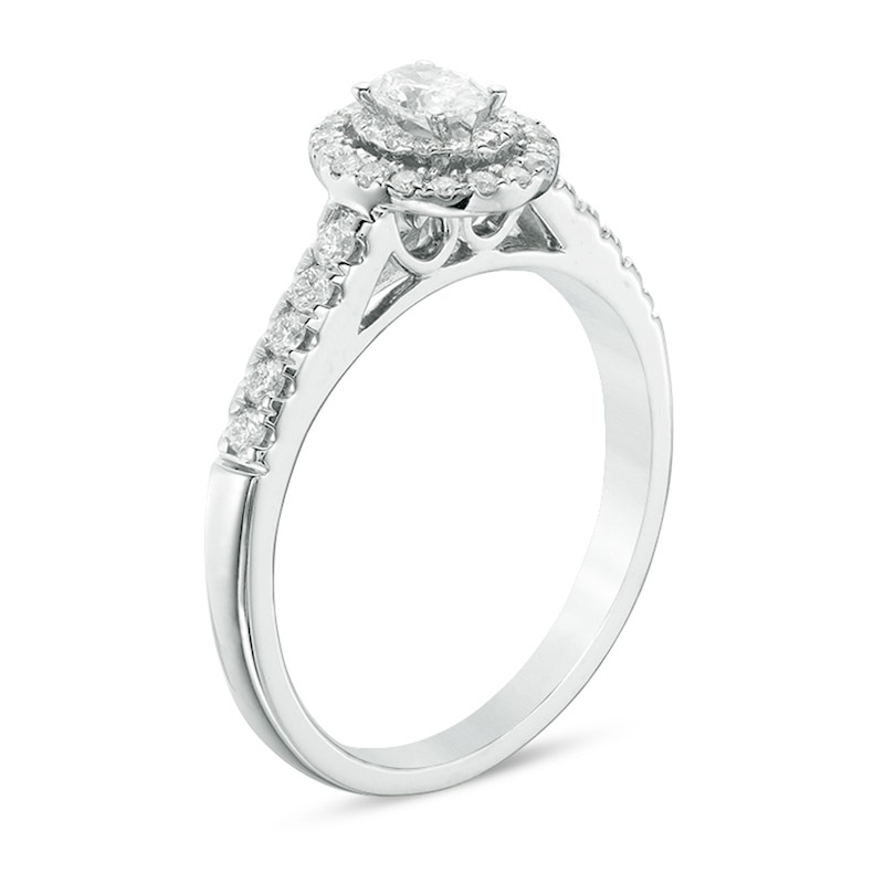 Previously Owned - 1/2 CT. T.W. Oval Diamond Double Frame Engagement Ring in 14K White Gold