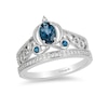 Thumbnail Image 1 of Previously Owned - Enchanted Disney Cinderella Blue Topaz and 1/10 CT. T.W. Diamond Carriage Ring in Sterling Silver