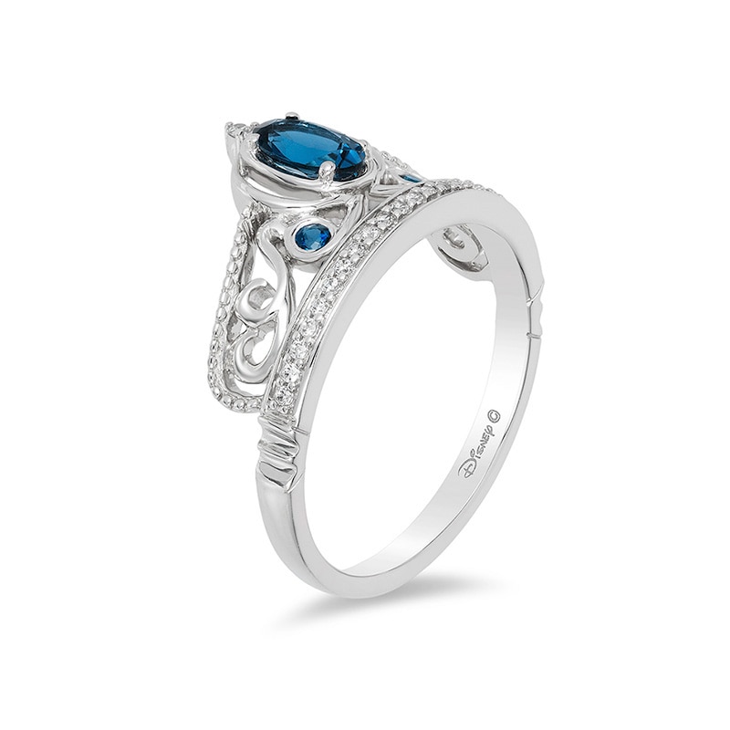 Previously Owned - Enchanted Disney Cinderella Blue Topaz and 1/10 CT. T.W. Diamond Carriage Ring in Sterling Silver