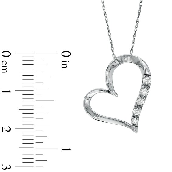 Previously Owned - 1/6 CT. T.w. Diamond Five Stone Heart Pendant in 10K White Gold