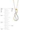 Thumbnail Image 2 of Previously Owned - 1/10 CT. T.W. Diamond Swirl Infinity Loop Pendant in 10K Gold
