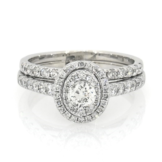 Previously Owned 1-1/5 CT. T.w. Diamond Double Oval Frame Soldered Bridal Set in 14K White Gold