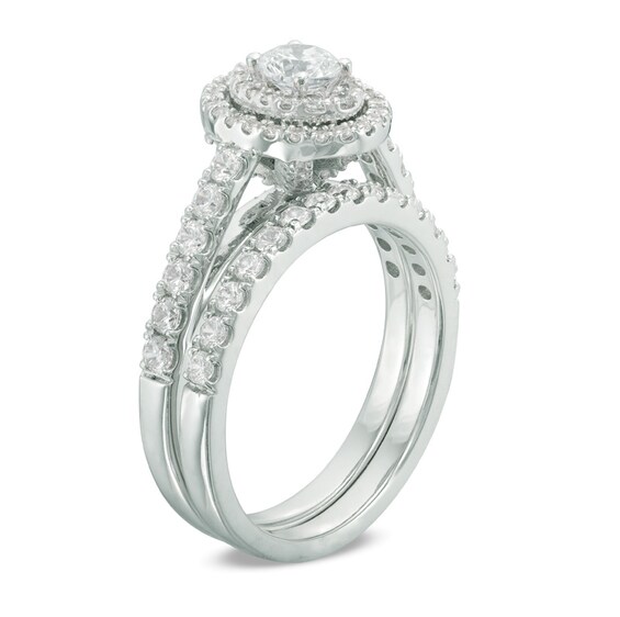 Previously Owned 1-1/5 CT. T.w. Diamond Double Oval Frame Soldered Bridal Set in 14K White Gold
