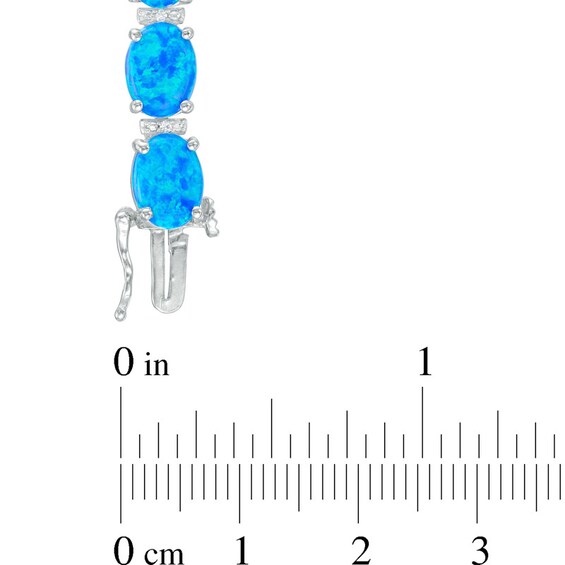 Previously Owned - Oval Lab-Created Blue Opal and White Sapphire Bracelet in Sterling Silver - 7.5"