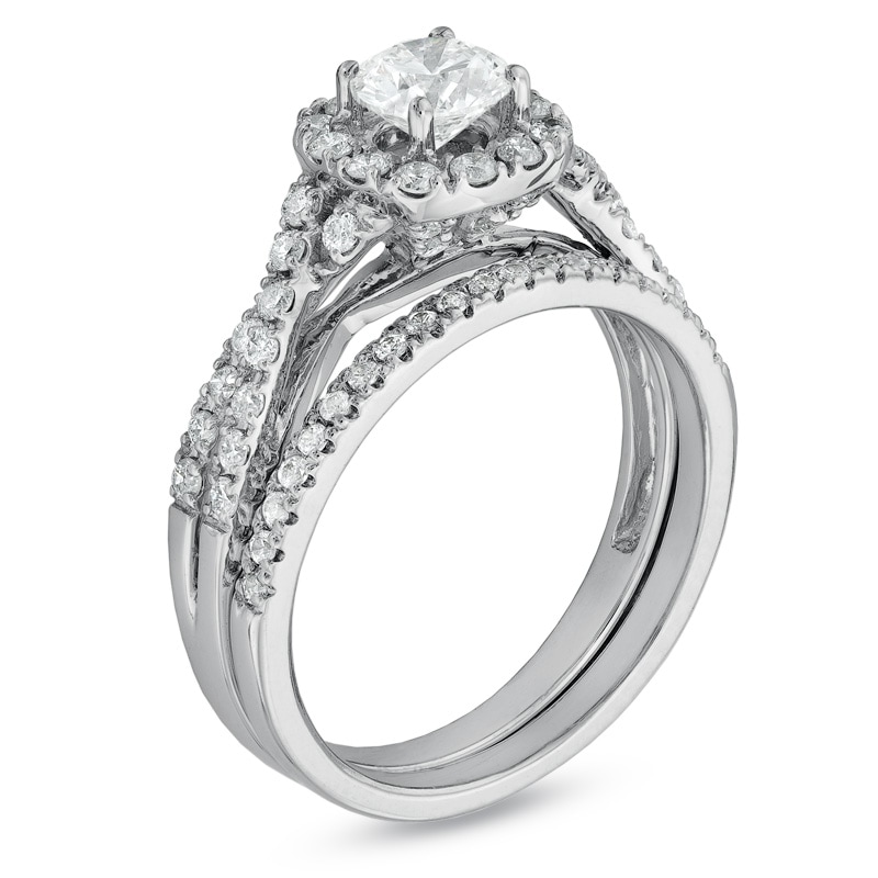 Previously Owned - 1 CT. T.W. Diamond Frame Twist Bridal Set in 14K White Gold