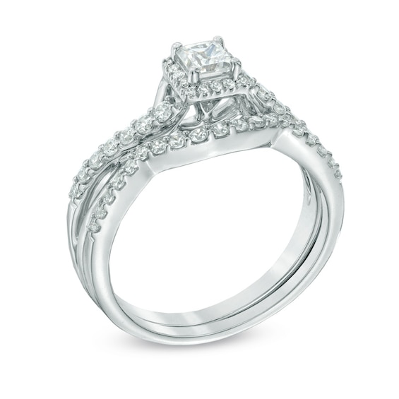 Previously Owned - 3/4 CT. T.w. Princess-Cut Diamond Frame Twist Shank Bridal Set in 10K White Gold