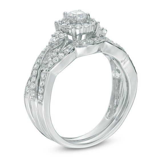 Previously Owned - 5/8 CT. T.w. Diamond Frame Twist Bridal Set in 10K White Gold