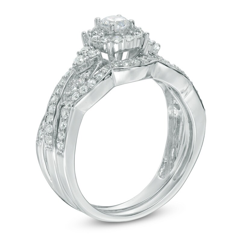 Main Image 2 of Previously Owned - 5/8 CT. T.W. Diamond Frame Twist Bridal Set in 10K White Gold