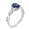 Previously Owned - Oval Lab-Created Blue and White Sapphire Twist Ring in Sterling Silver