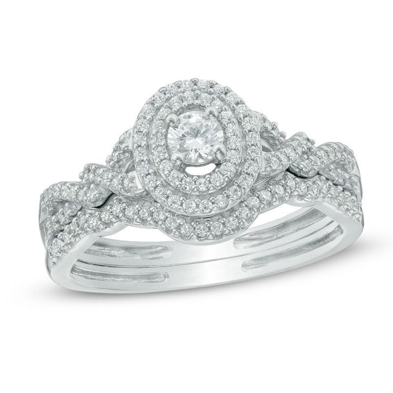 Main Image 1 of Previously Owned - 1/2 CT. T.W. Diamond Oval Frame Loose Braid Bridal Set In 10K White Gold