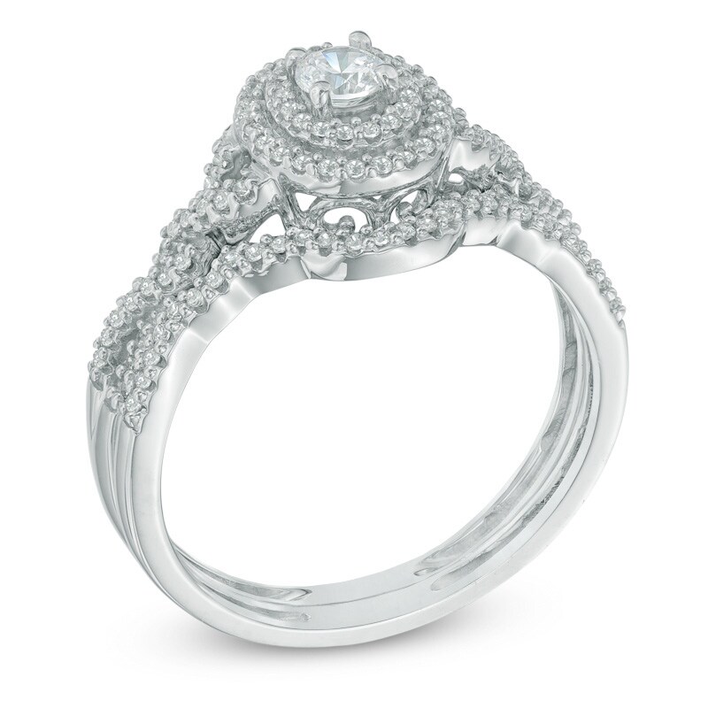 Main Image 2 of Previously Owned - 1/2 CT. T.W. Diamond Oval Frame Loose Braid Bridal Set In 10K White Gold