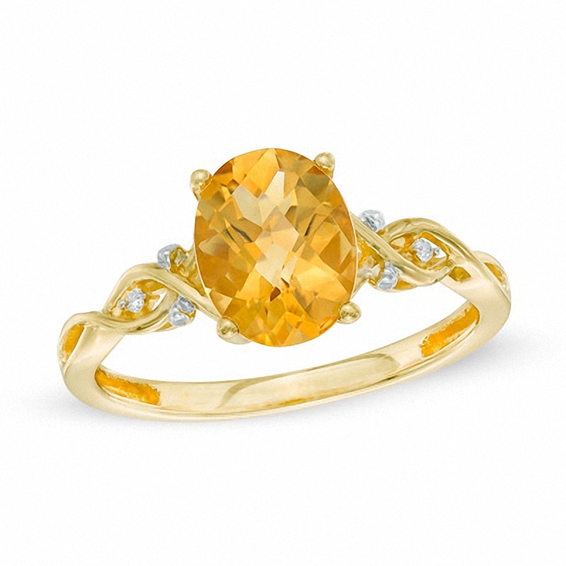 Previously Owned - Oval Citrine and Diamond Accent Braid Ring in 10K Gold