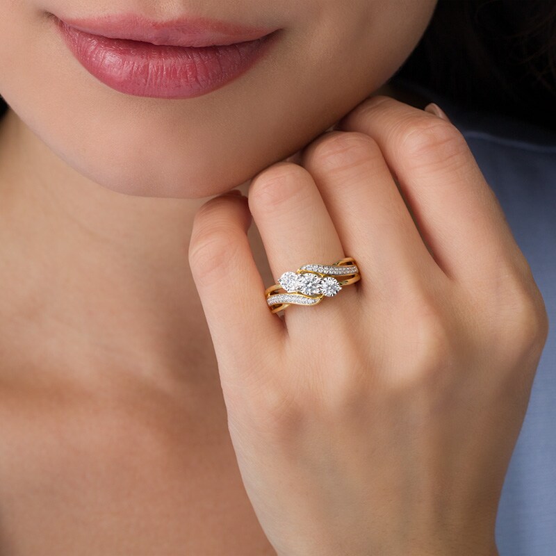 Previously Owned - 1/2 CT. T.W. Diamond Past Present Future® Bypass Engagement Ring in 10K Gold