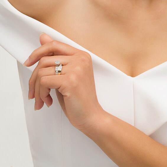Previously Owned - and 1/4 CT. T.w. Diamond Frame Three Piece Bridal Set in 10K Two-Tone Gold