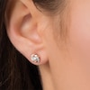 Previously Owned - 1/8 CT. T.W. Diamond Love Knot Stud Earrings in 10K Rose Gold