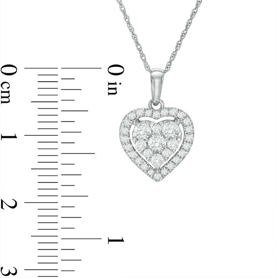 Previously Owned - 1/2 CT. T.w. Diamond Heart Frame Pendant in 10K White Gold