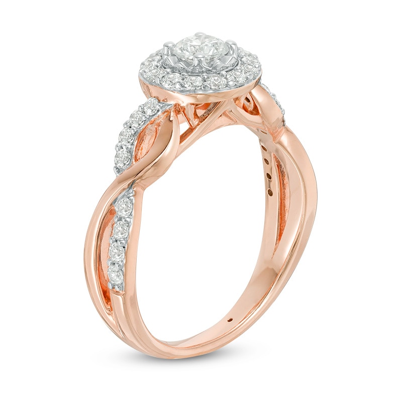 Previously Owned - 5/8 CT. T.W. Diamond Frame Twist Engagement Ring in 14K Two-Tone Gold
