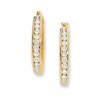 Thumbnail Image 1 of Previously Owned - 1/4 CT. T.W. Channel-Set Diamond Oval Hoop Earrings in 14K Gold