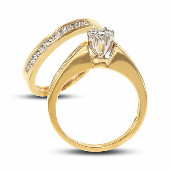 Previously Owned 1 CT. T.w. Multi-Diamond Flower Soldered Bridal Set in 10K Gold