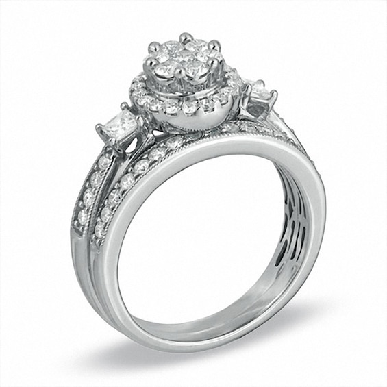 Previously Owned - 1 CT. T.w. Round and Princess-Cut Diamond Flower Bridal Set in 10K White Gold