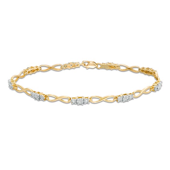 Previously Owned - 1/10 CT. T.w. Diamond Three Stone Infinity Bracelet in 10K Gold - 7.25"