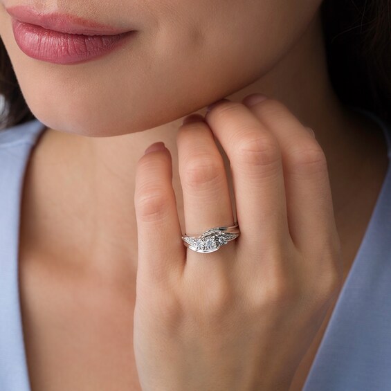 Previously Owned - 1/4 CT. T.w. Diamond Past Present FutureÂ® Bypass Engagement Ring in 10K White Gold