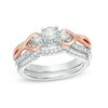 Thumbnail Image 1 of Previously Owned - 1/2 CT. T.W. Diamond Three Stone Loop Twist Bridal Set in 10K Two-Tone Gold