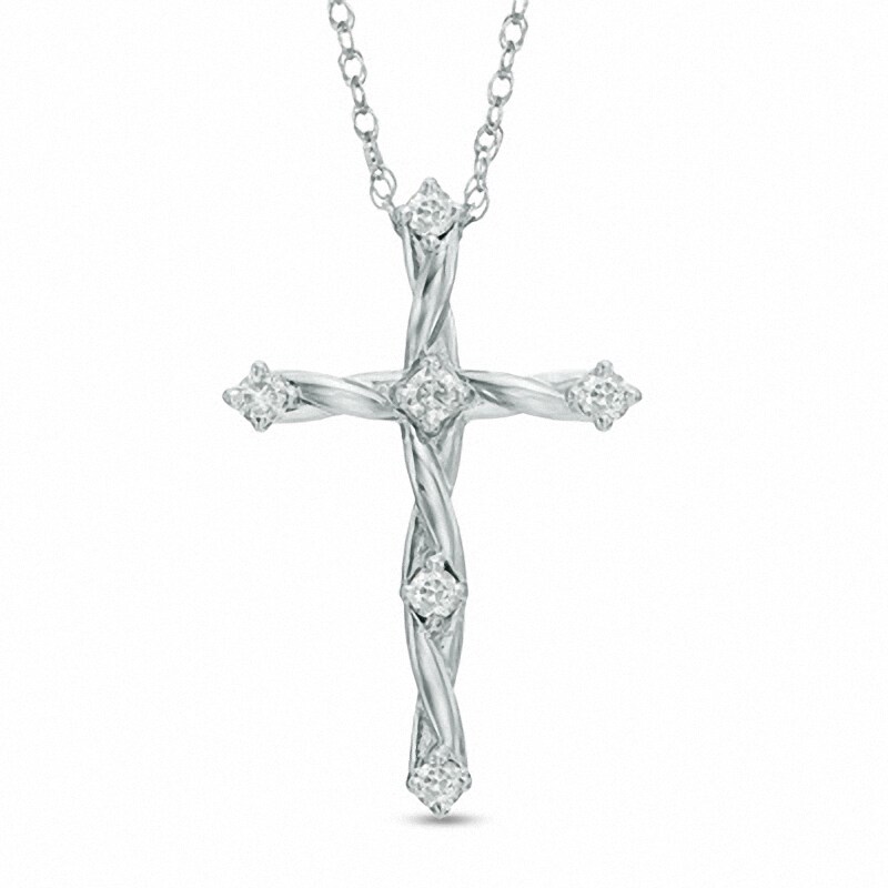 Main Image 1 of Previously Owned - 1/8 CT. T.W. Diamond Twisting Cross Pendant in 10K White Gold