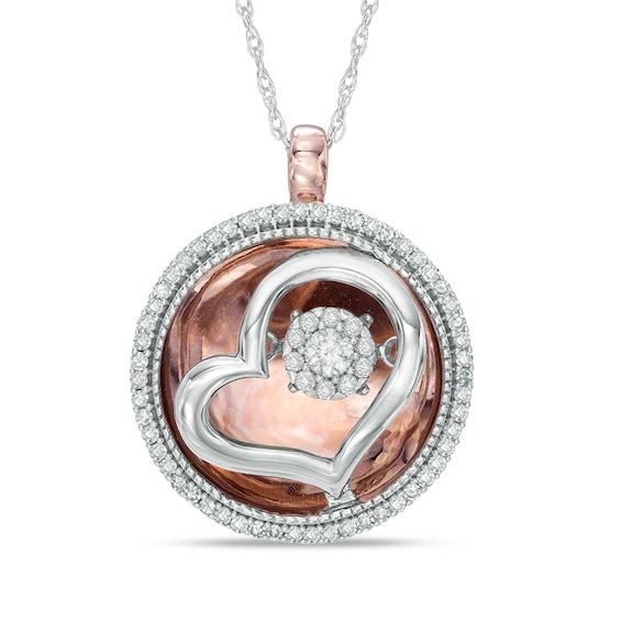 Previously Owned - 1/4 CT. T.w. Diamond Heart Pendant in 10K Two-Tone Gold