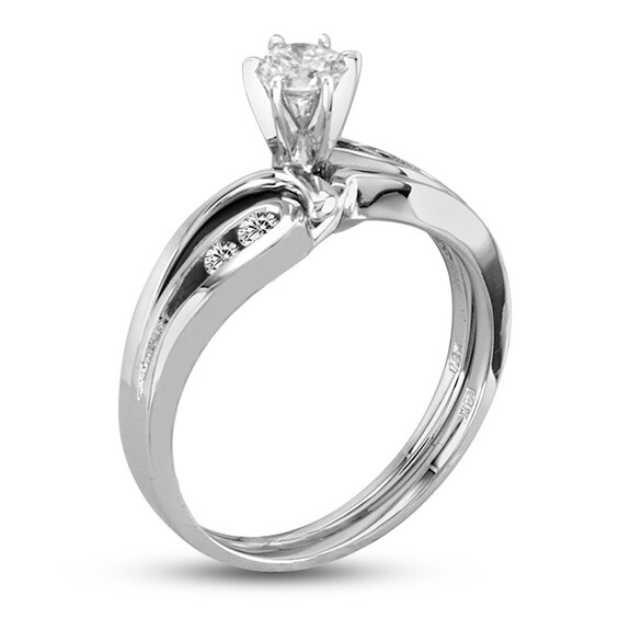 Previously Owned - 1/2 CT. T.w. Diamond Bypass Bridal Set in 14K White Gold