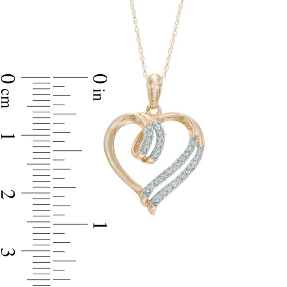 Previously Owned - 1/10 CT. T.w. Diamond Double Row Heart Pendant in 10K Gold